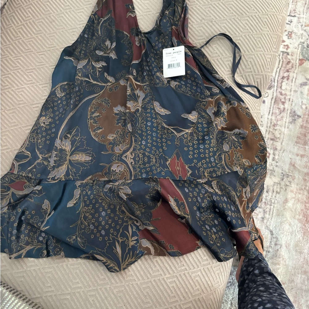 Beautiful free people never worn backless dress lots of detail